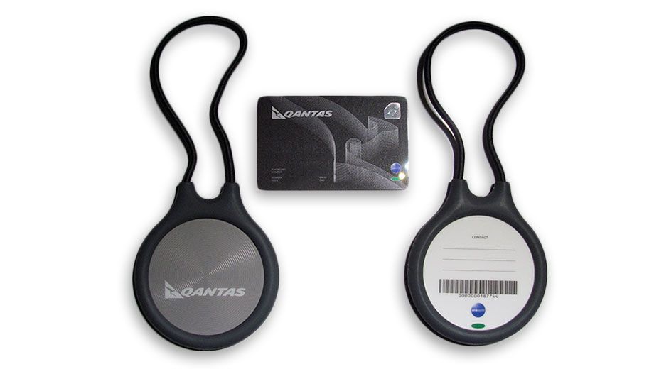 The redesigned 2011 Qantas card (aka Q Card) flanked by the bag tags