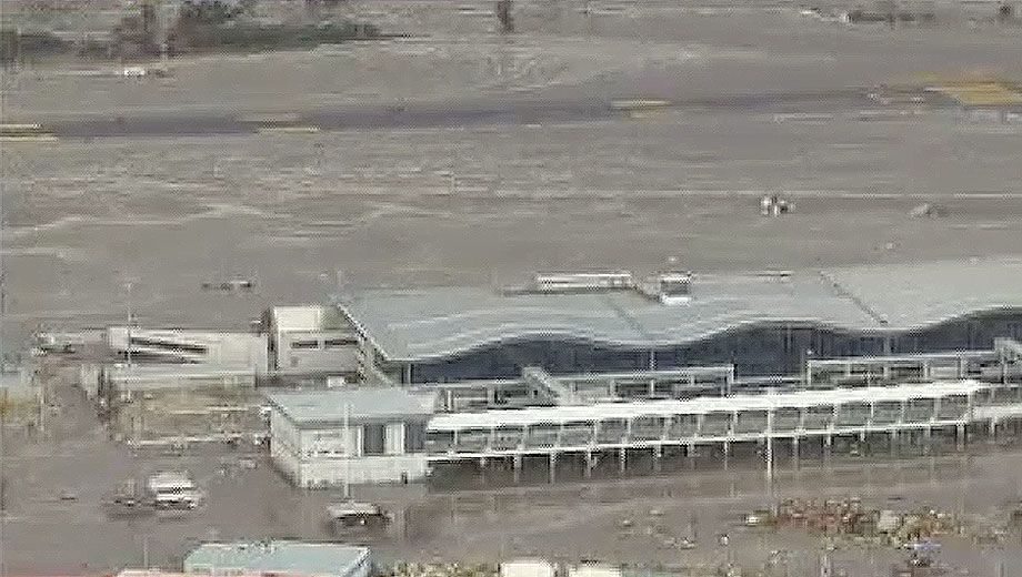 Sendai Airport hit by tsunami triggered by Japan earthquake