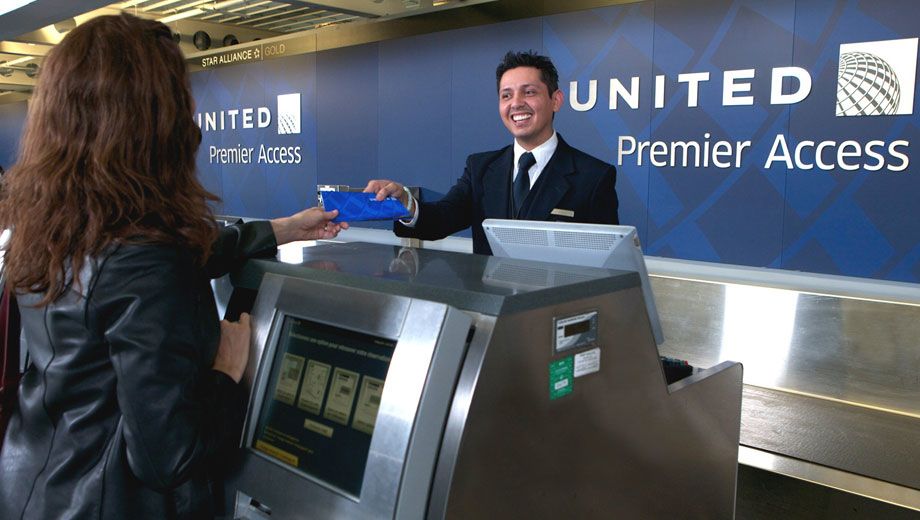 United Airlines: Business travellers board before families