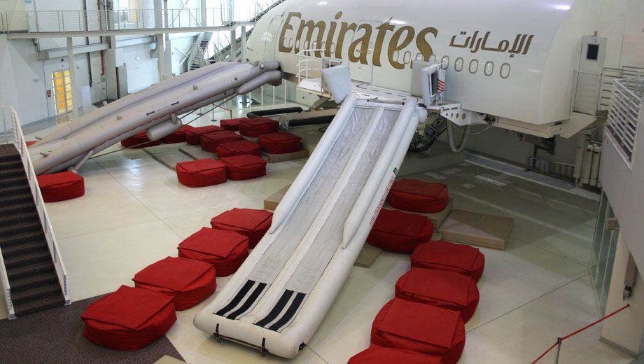 Fires, escape slides and champagne: training Emirates' cabin crew