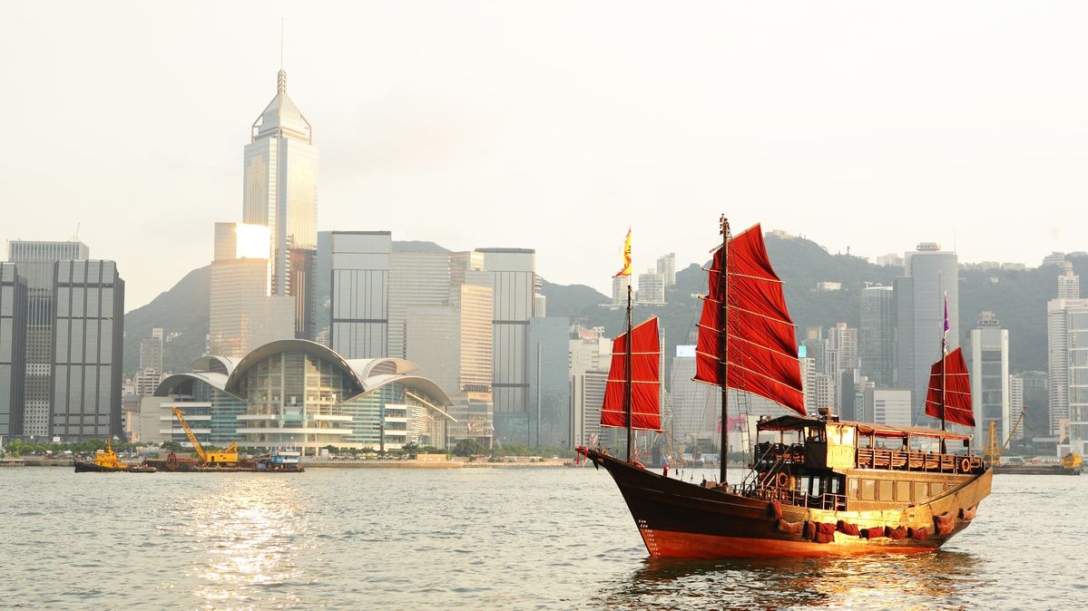 Hong Kong trims hotel quarantine to three days to revive hub