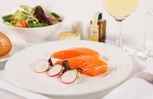The business class appetiser partners smoked salmon with a green gazpacho gel and a salad of micro-greens.