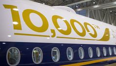 On board Airbus' 10,000th delivery flight