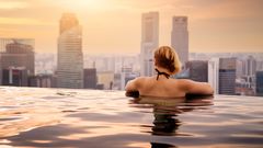 Singapore halves Covid tests for vaccinated travellers