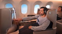Qantas drops mask mandate on some international flights