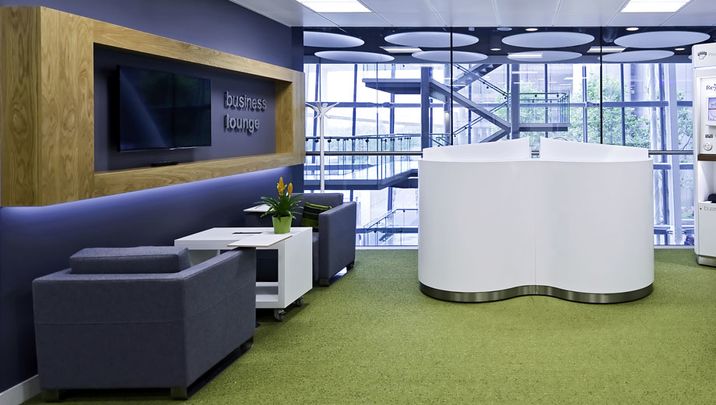 Qantas Aquire arrivals lounge at Heathrow