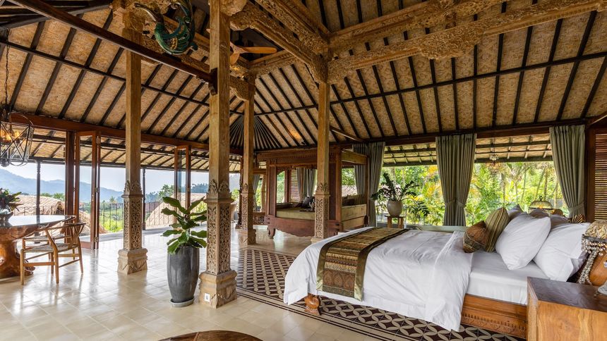 The spacious Joglo Villa features a private pool and lavish ensuite, plus indoor and outdoor dining spaces.