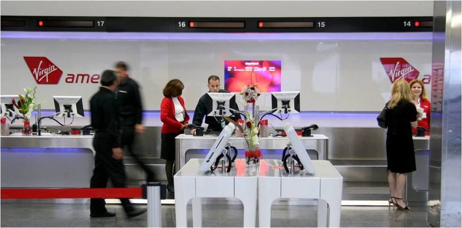 Virgin America's check-in counters are more like the Apple Store than an airline desk.