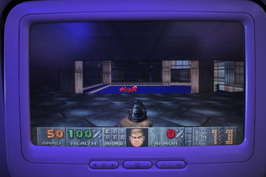 Doom being played on a Virgin America seat-back monitor.