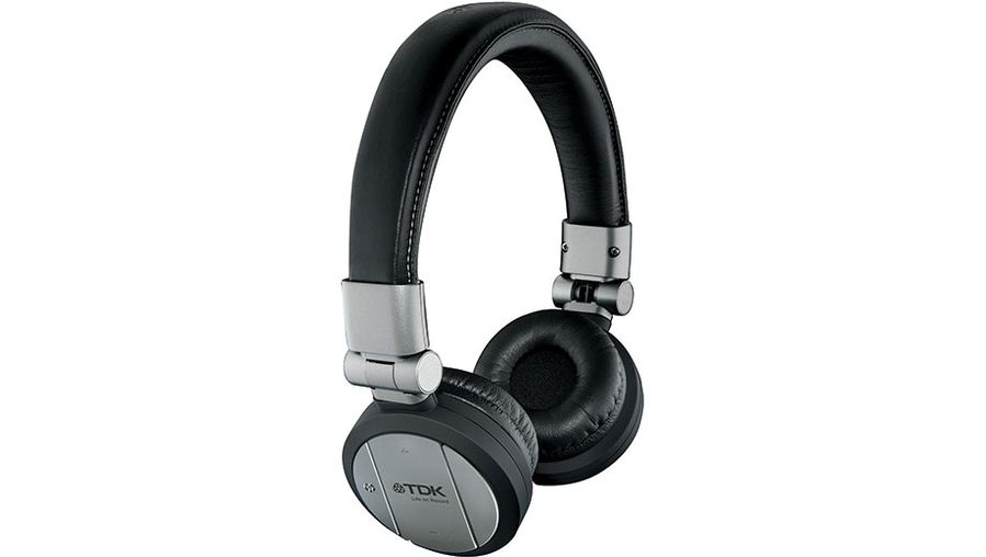 TDK WR-700 wireless headphones -- they take a AA battery and have volume controls on the headphones.