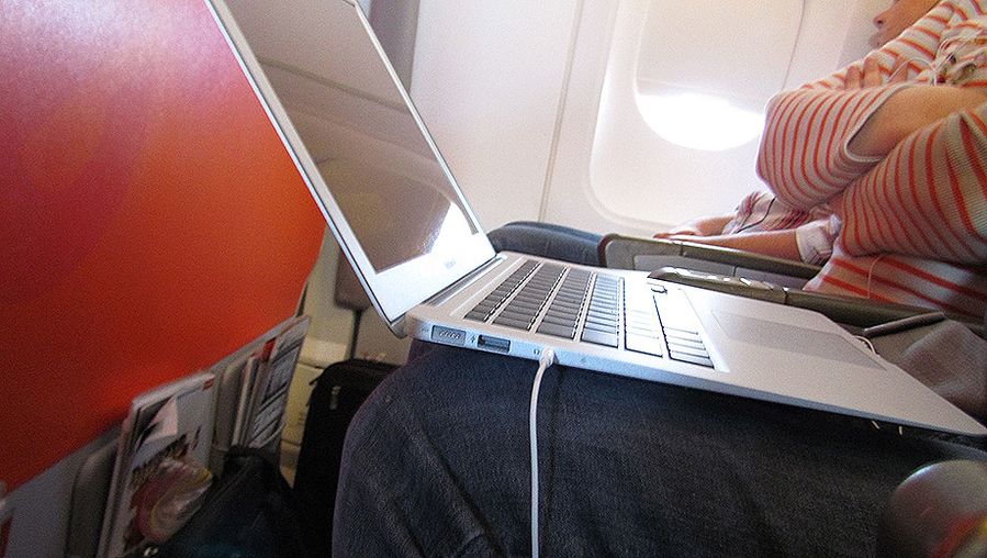 The side-on view of the MacBook Air inflight shows how comfortable it is to use. 