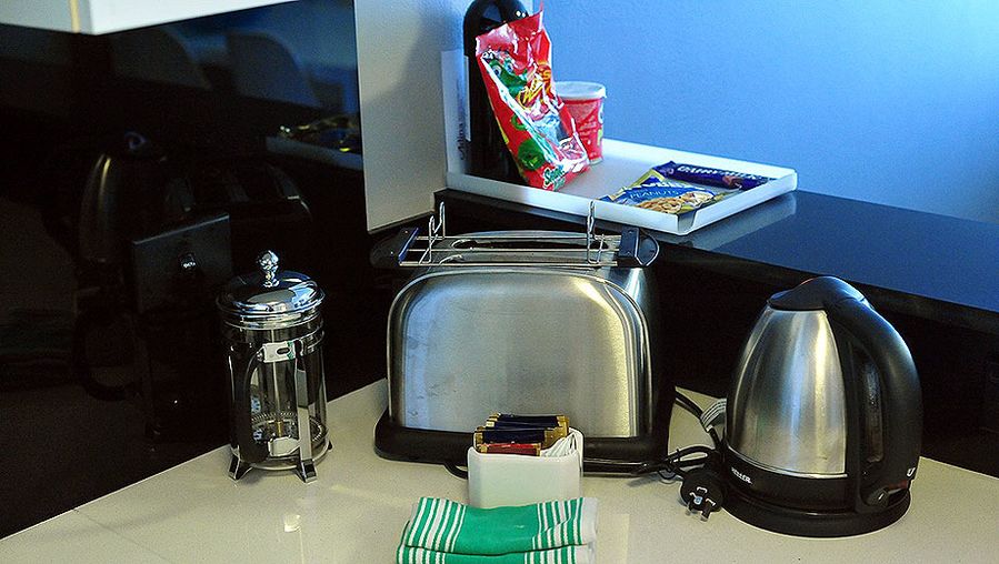 Toaster, kettle, coffee plunger (though no ground coffee that we could see..)