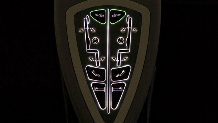 The seat controls are located at the edge of the seat console and backlit for ease of use during the night