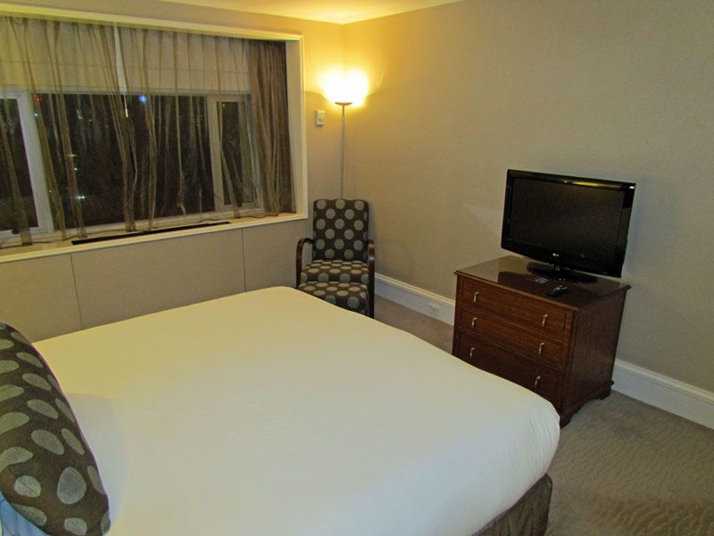 A separate armchair with ottoman in the bedroom was a nice touch.