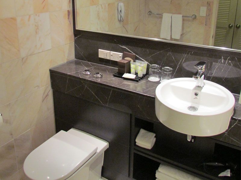 The bathroom was classy and warm, with good water pressure and soft towels.