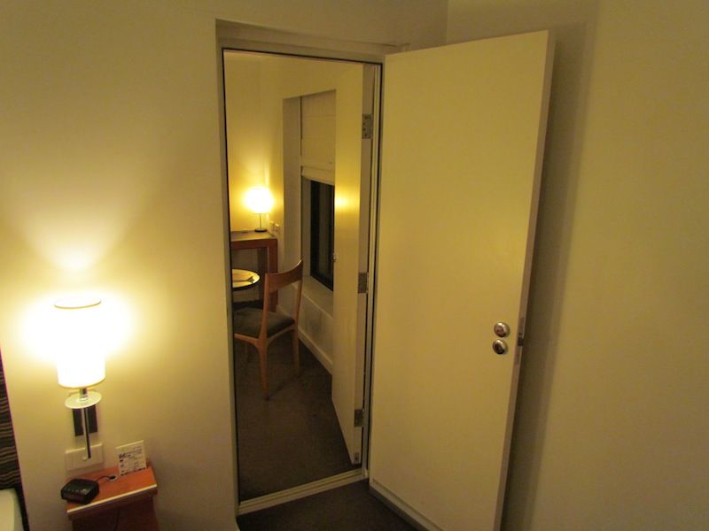 A connecting door at the far end of the suite leads through to the living/working room.