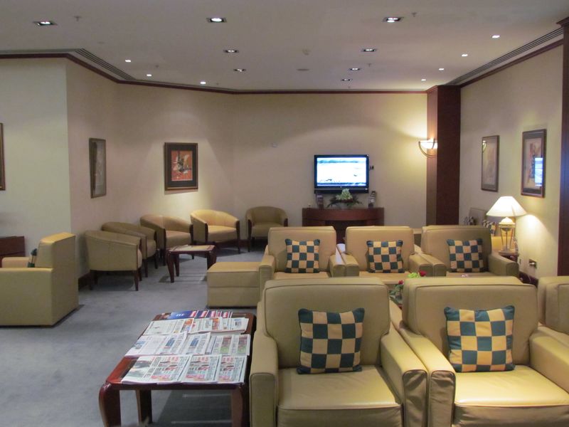 On the other side of reception, there's another lounge room with TVs and comfortable chairs.