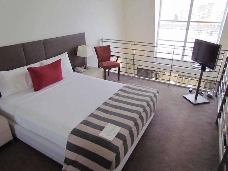The bedroom is light and airy, with a great view over the railway station.