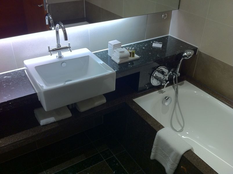 The simple, elegant bathroom is well-designed for jetlagged guests.