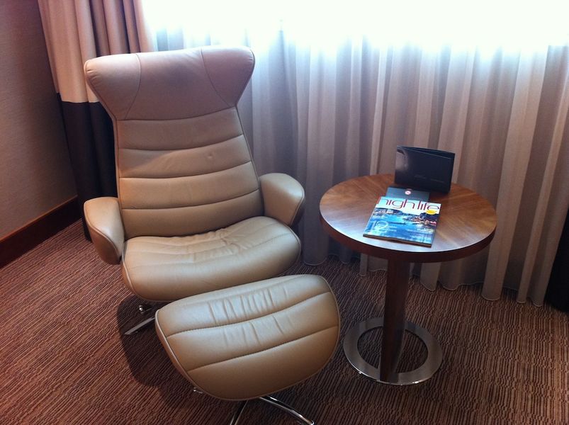 The reclining leather chair is comfortable, but a sofa would have been better.