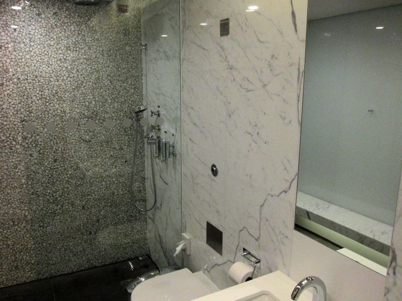 With glass and marble everywhere, these are the best shower rooms in T3 oneworld lounges.