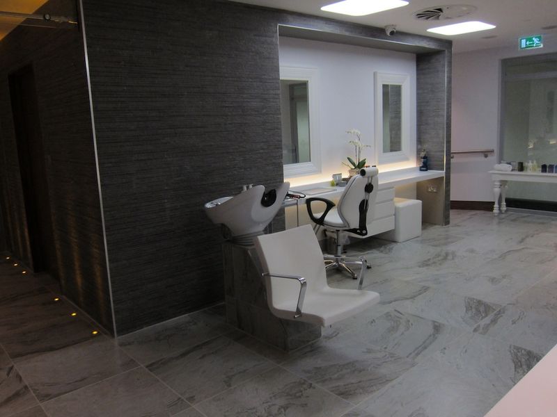 The salon, with hair stylist and barber, is a nice touch.