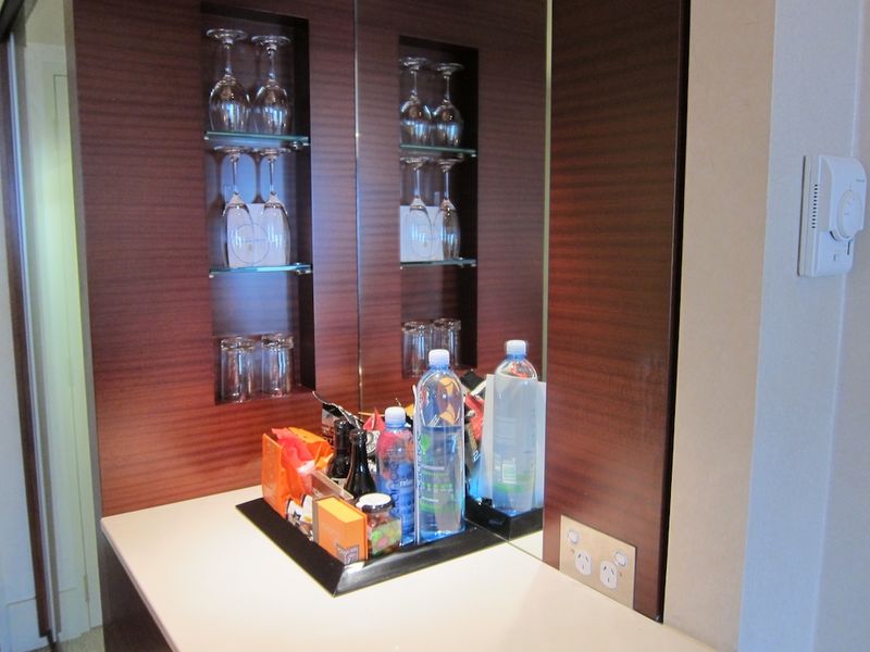 The well-stocked minibar contains some tempting snacks.