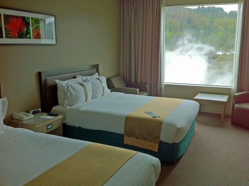 The reflected glow from the steam rising from the thermal pools outside makes the room particularly bright.