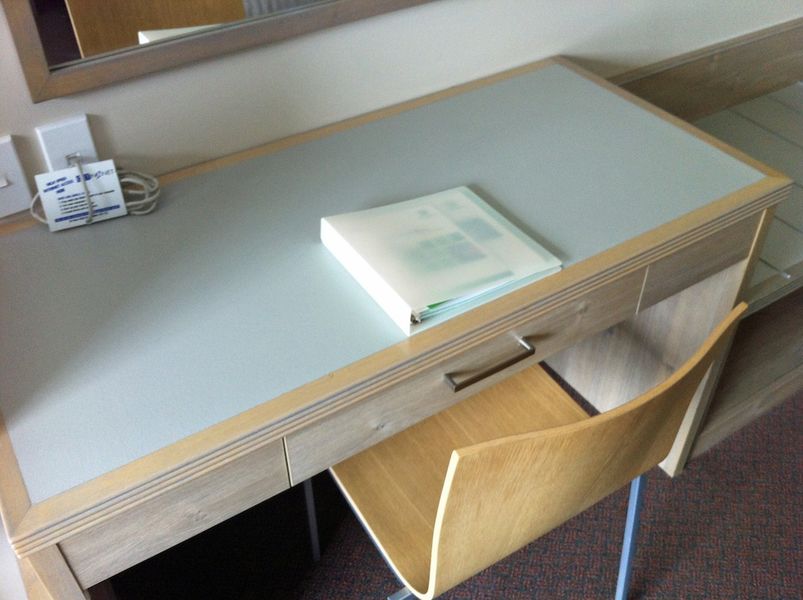 I was underwhelmed by the desk setup, so I ended up working with my laptop on my knees.