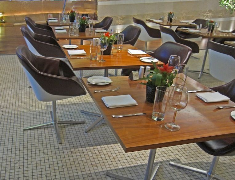 You don't have to sit at one of the dining tables to have a bite to eat -- the staff will bring you something wherever you are in the lounge.