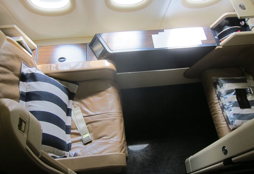 First impressions: no bling, elegant leather, and dark wood.