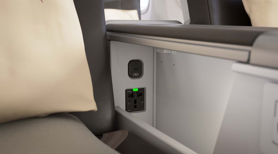 Each seat boasts a spacious side pocket for easy access to personal items as well as AC and USB power sockets.