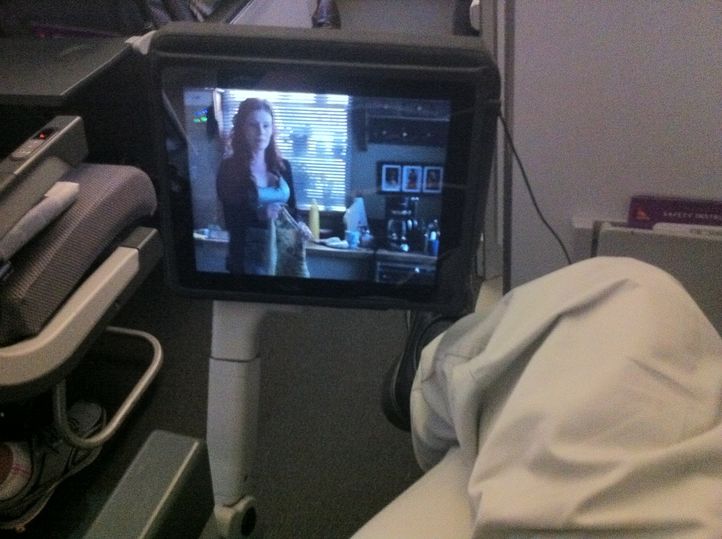 Voila - it hangs neatly over the inflight entertainment screen.