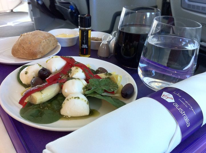 Virgin's bocconcini, artichoke and spinach starter -- hand dressed by the cabin crew in front of us -- stole the show.