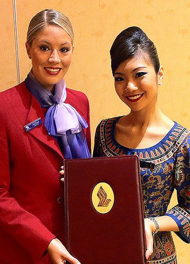 A telling sign? The ceremonial signing papers were in a Singapore Airlines logo folder.