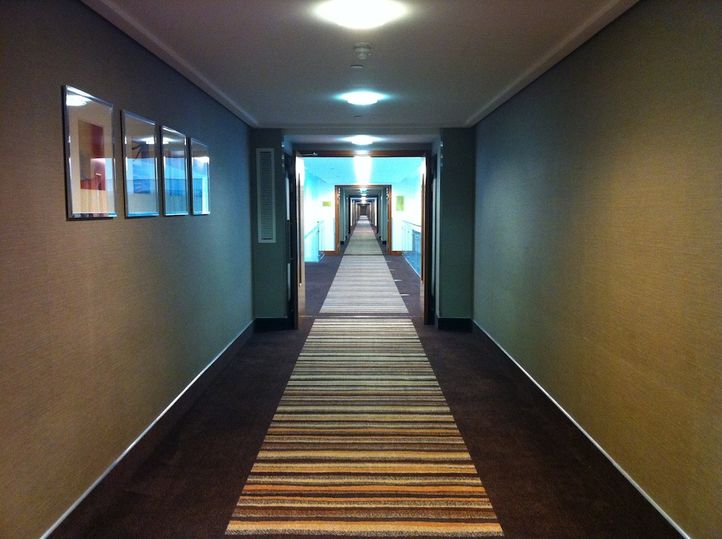 The main link corridor is long, but at least it's bright, with sections open to each wing's atrium.