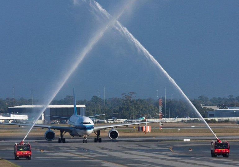 Perth airport rolled out a double water-cannon welcome for China Southern's first flight to WA.