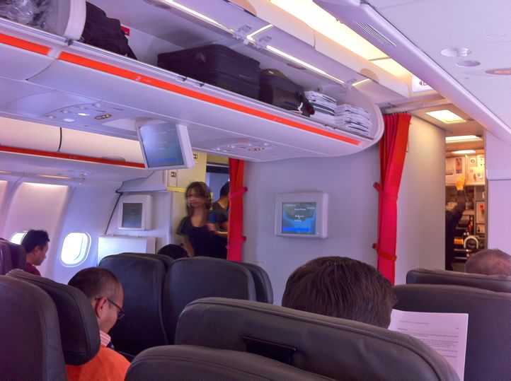 If the seats are a reminder of what business class used to be like 20 years ago, so is the in-flight video...