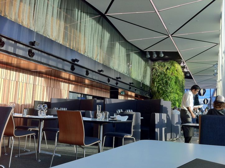 The lobby (and its green, leafy living wall) is at the far end of the Square restaurant on the ground floor.