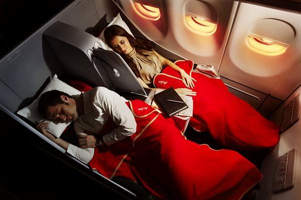 AirAsia X has a lie-flat bed as seen in many airlines' business class, for around the price of premium economy.