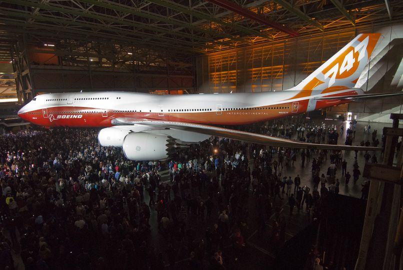 The fourth-gen Boeing 747-8 dwarfs the crowd at its debut in early 2011