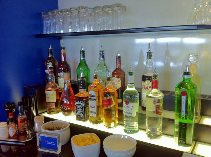 Posh gin, a decent range of spirits...and this is only half the liquor cabinet.