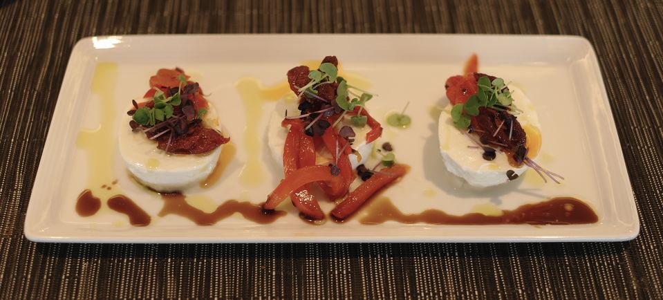 Sweet peppers add a seasonal twist to the buffalo mozzarella