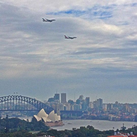 Framed by the Opera House and the Harbour Bridge. Richard Bell