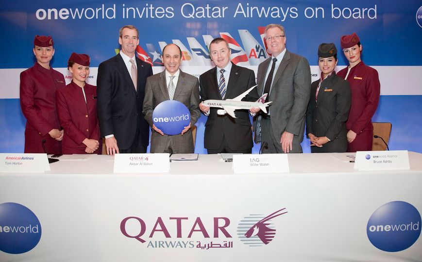 Bruce Ashby (last bloke on the right) welcomes Qatar to the oneworld family