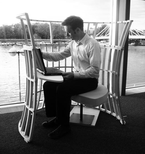The small desk does double-duty for working and snacking