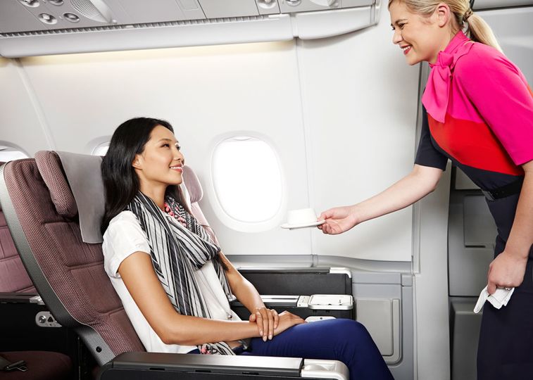 Enjoy Qantas' award-winning premium economy seat, meals and service