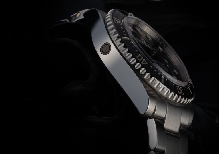 The helium escape valve on a Rolex Sea-Dweller.