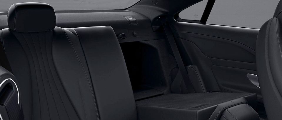 The new generation of E Class is four inches longer, wheel-to-wheel, and 2.9 Inches wider than its predecessor, affording more space. Split rear seats allow for storage through the trunk