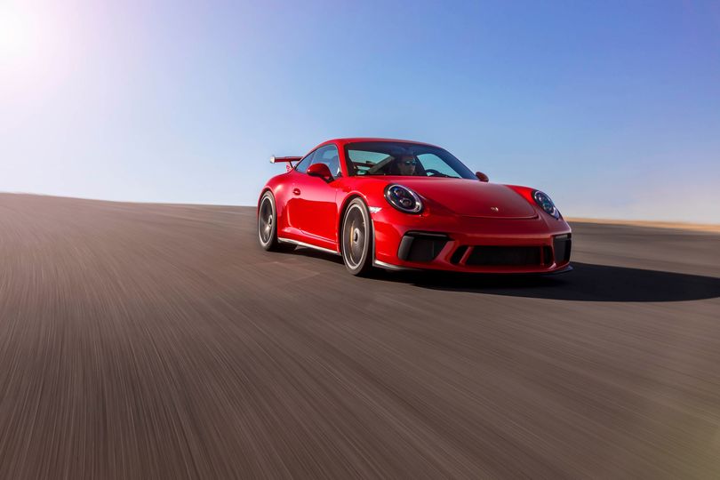 The Porsche 911 GT3, the flashy older sibling to the GTS. (Note the spoiler in back)